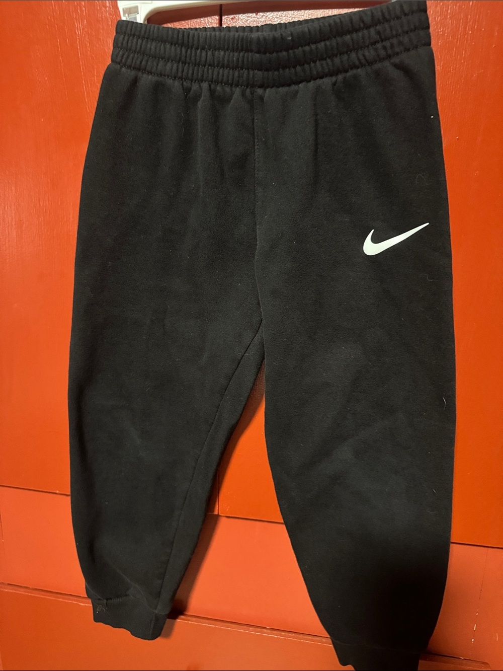 Nike Kids Black Joggers with White Swoosh